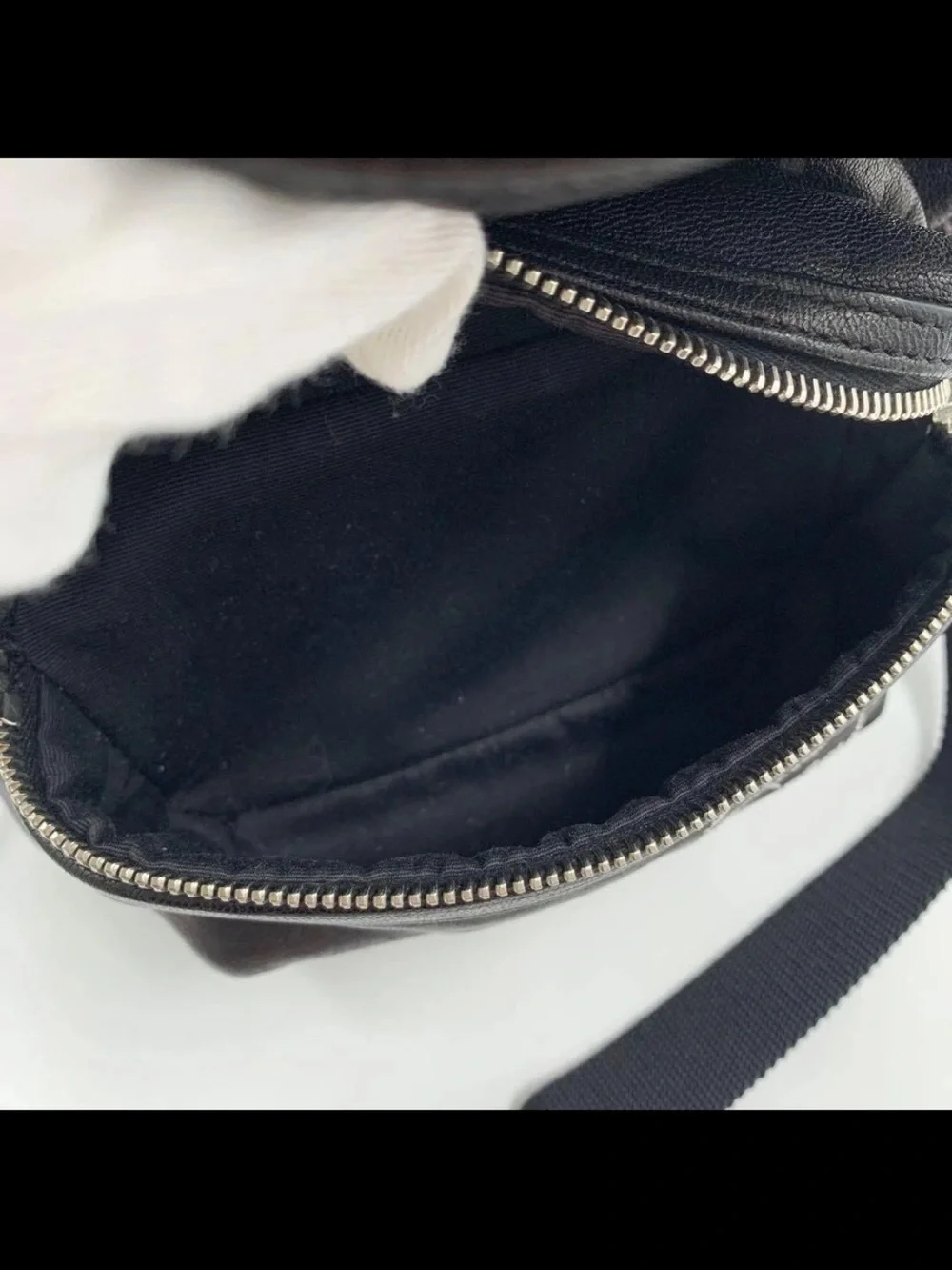 Saint Laurent Black Leather Backpack with Front Logo Pocket